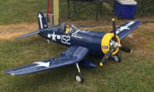 A model aircraft is placed in the lawn area