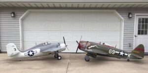 Side view of two model aircrafts standing face to face